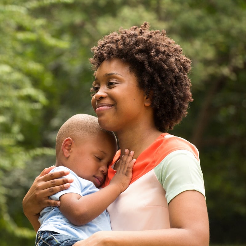 New Patients A Black mother holds her infant